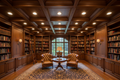 Beautifully finished coffered ceiling in a traditional home library with deep rectangular coffers, recessed lighting, and warm evening ambient light