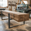 Bundle of door stop moulding stacked on lumber rack in carpenter workshop