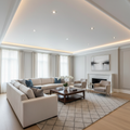 Wide living room with 4.5 inch crown moulding running full perimeter, bright white against light gray wall