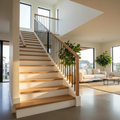Bright open-plan staircase with solid white oak treads and white risers, modern black steel railing